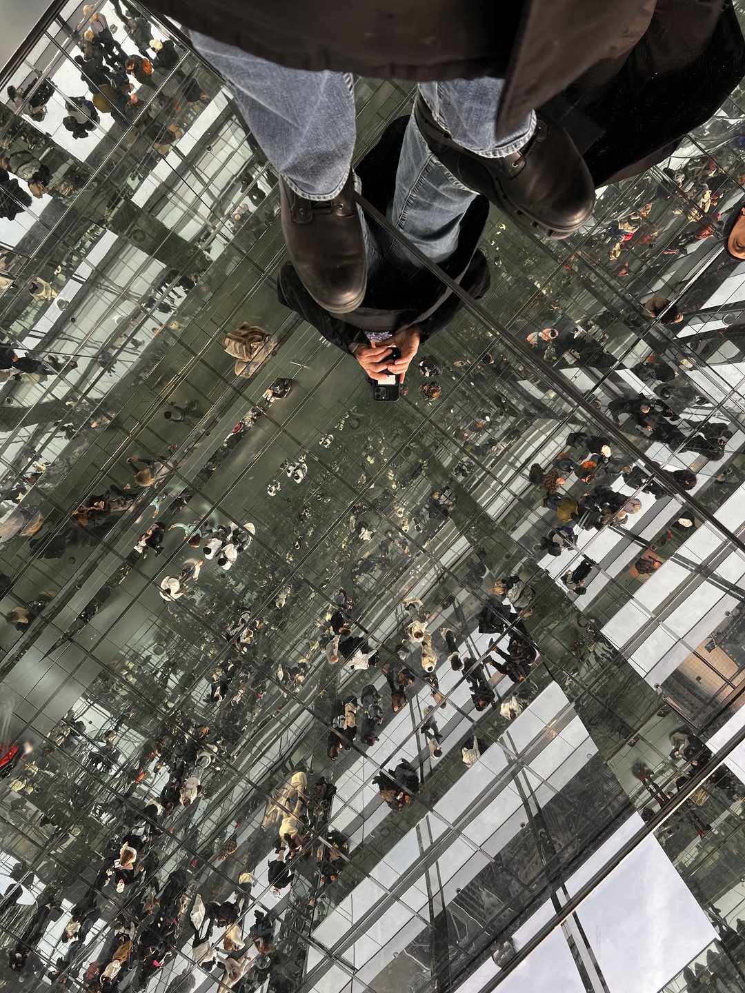 Summit One Vanderbilt mirror-floor reflection with visitors