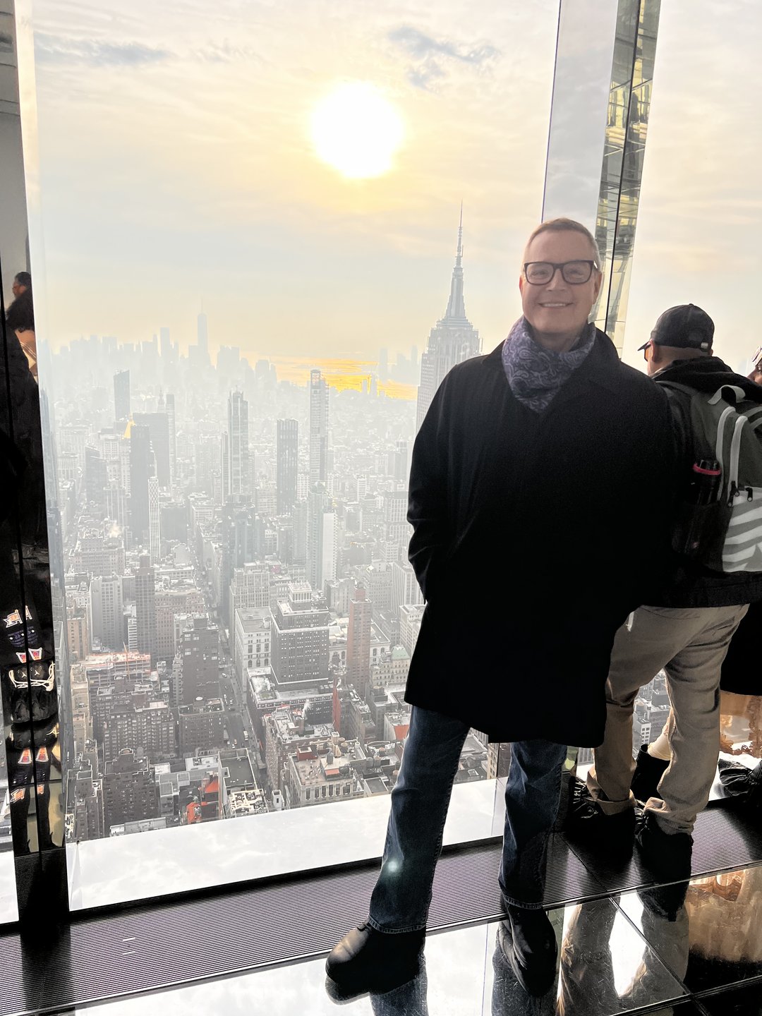 Visitor with Empire State Building and NYC skyline view at Summit One Vanderbilt